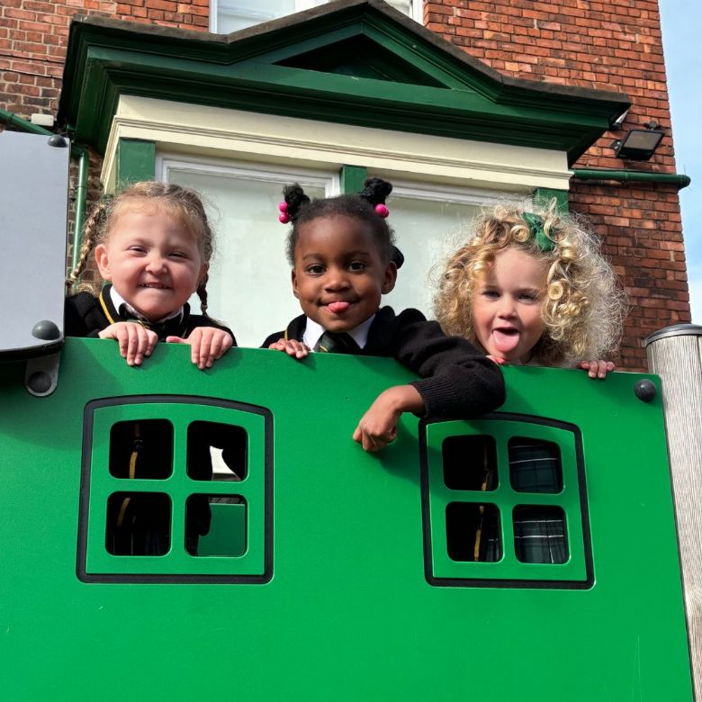 Young children on the play equipment 